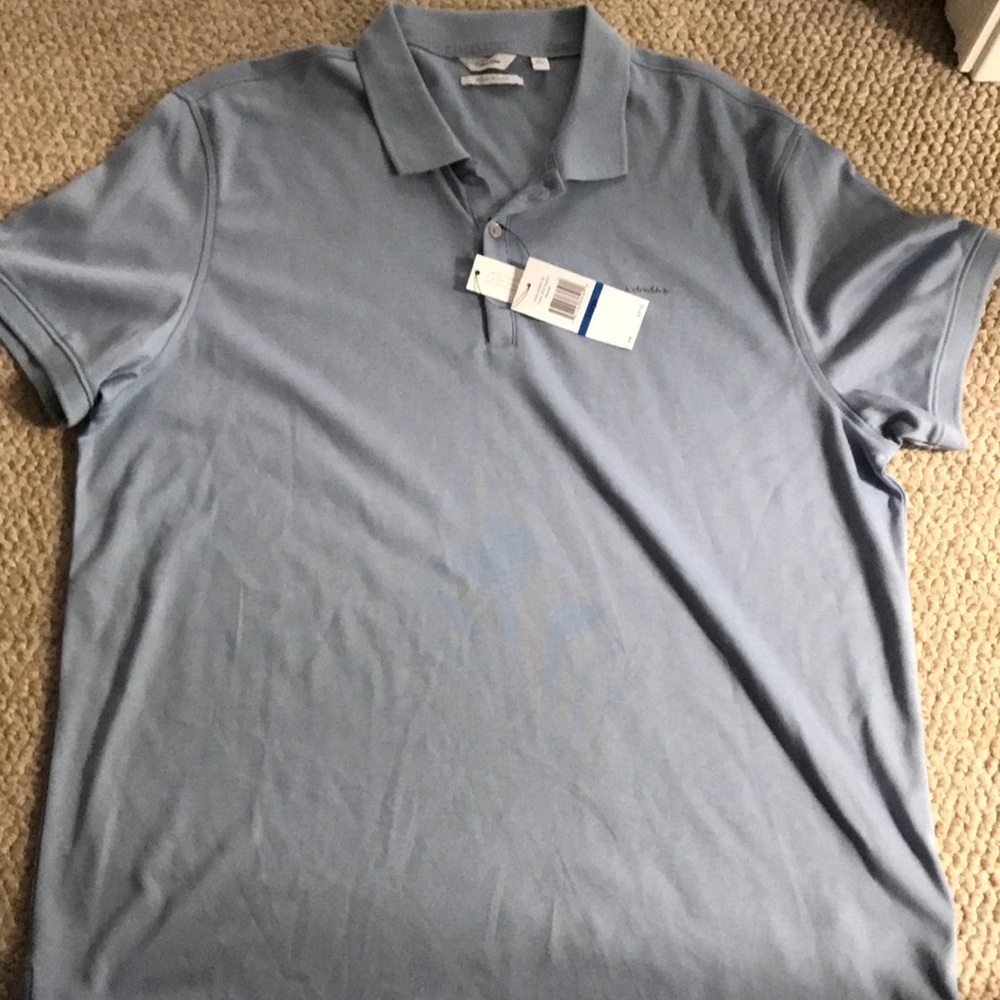 Light blue collard Calvin Klein shirt
